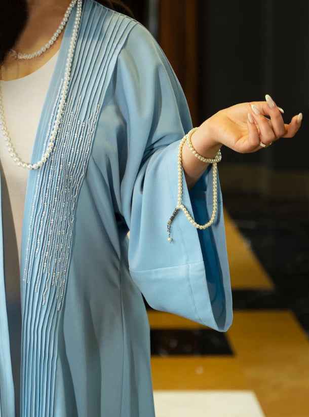 Ocean-ABY009 – Elegant Ocean-Blue Abaya with Pearl & Handcrafted Stitch Detailing