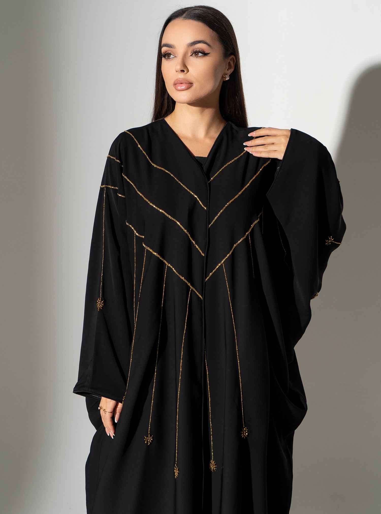 Cinder-ABY022 – Black Japanese Crepe Abaya with Exquisite Gold Bead Cascades