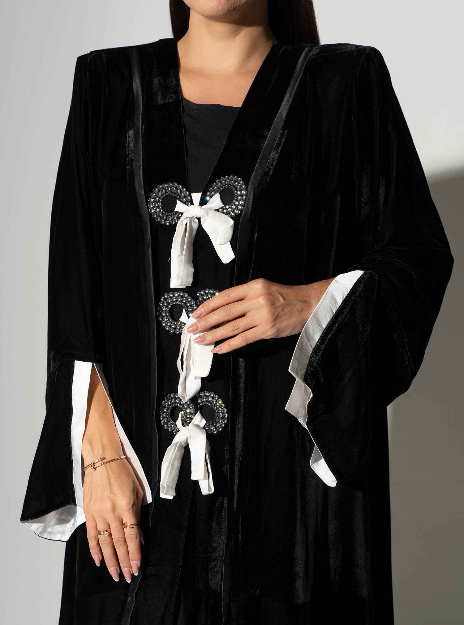 Piano-ABY023 – Elegant Black Velvet Abaya with Statement Bow Accents