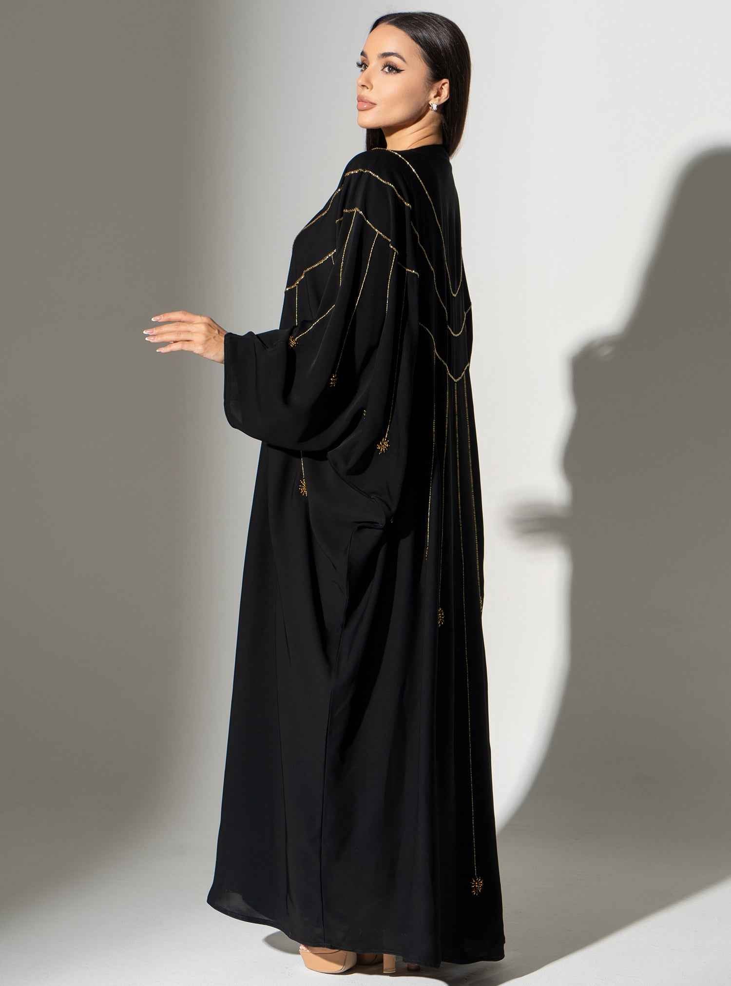 Cinder-ABY022 – Black Japanese Crepe Abaya with Exquisite Gold Bead Cascades